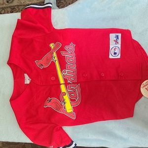 St Louis Cardinals Mark McGwire Youth small Jersey with authentic Champs Button.